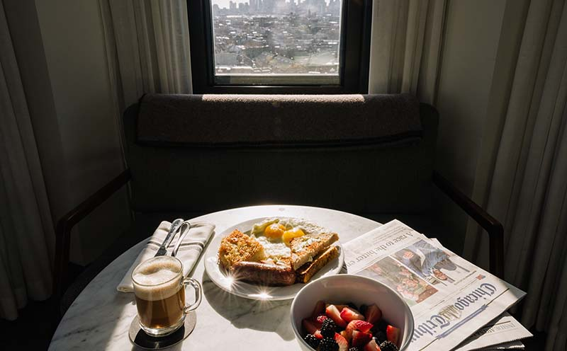 Breakfast setting in a room at The Robey Chicago