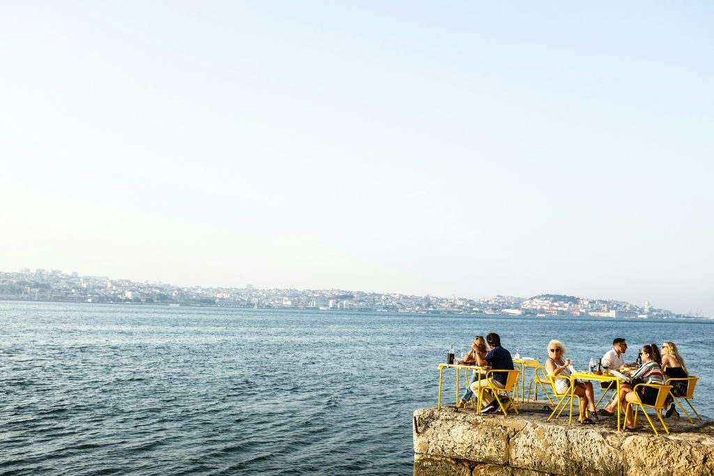 Outdoor dining by the waterfront in Lisbon